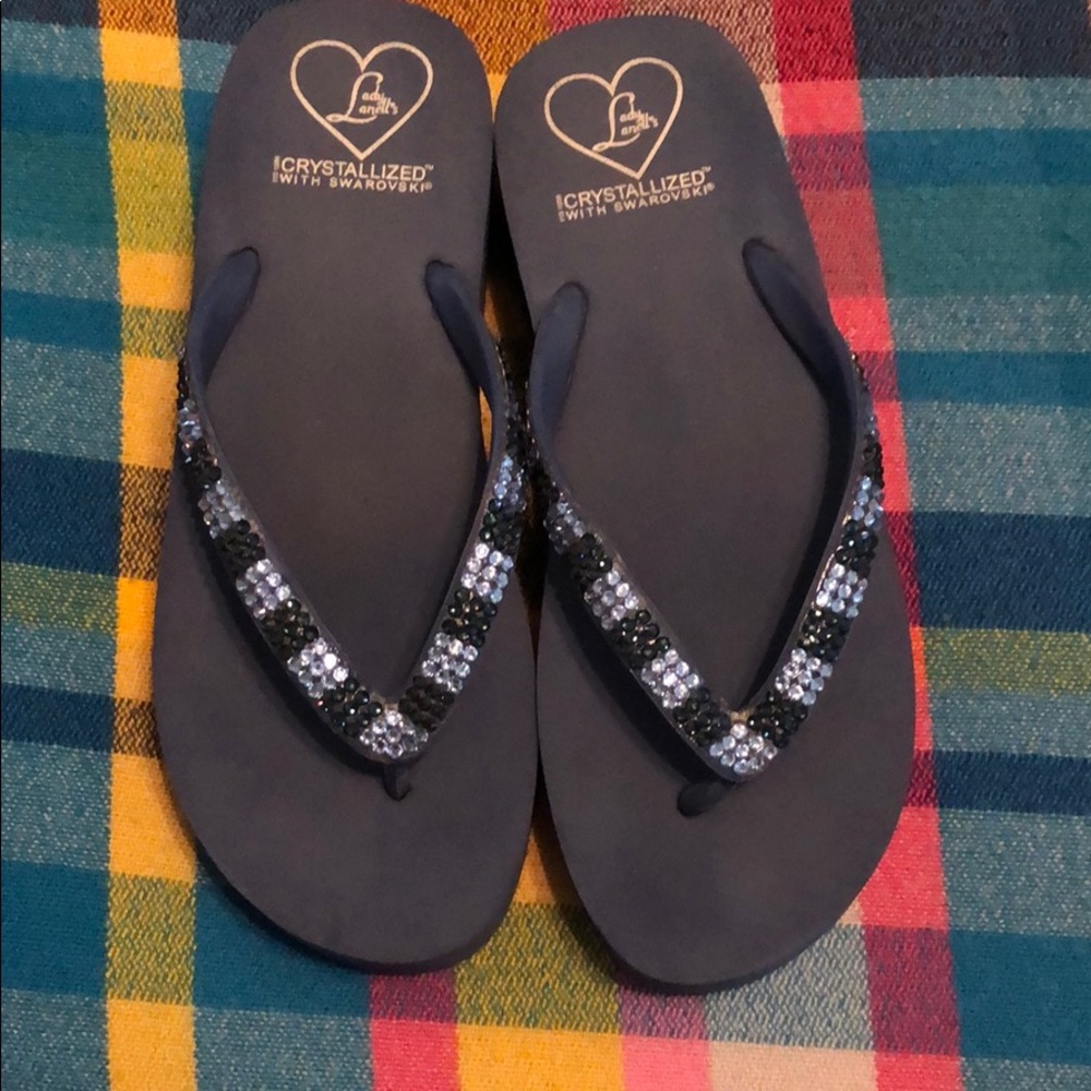 Navy crystal flip flops